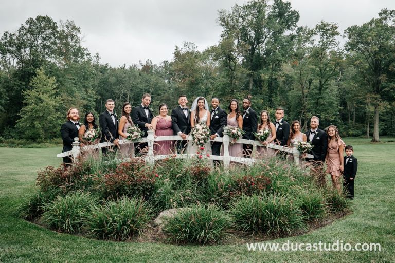 Nick and Elena posed with their wedding party
